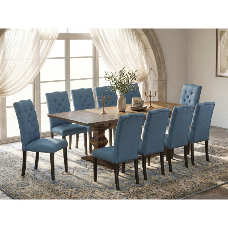 L'ensemble de salle à manger 11 pièces comprend une table de salle à manger rectangulaire avec rallonge amovible et 10 chaises de salle à manger Parson en tissu bleu