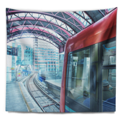 Tapisserie de paysage urbain au départ du métro de Londres