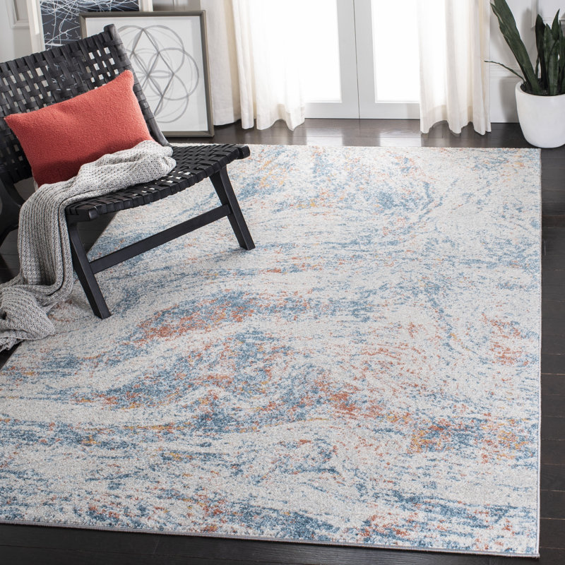 Ivory and Blue Abstract 9' x 12' Stain-Resistant Rug