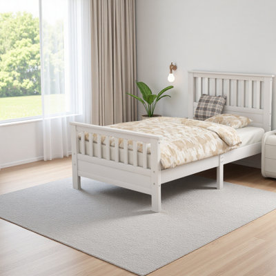 Lit plateforme en bois avec tête et pied de lit