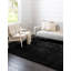 Tapis à poils longs en polyester tissé à la machine de couleur unie Burgy en noir onyx-1366939642