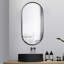 Stavya 36"H x 18"W Modern Minimalist Wall Mounted Oval Vanity Metal Mirror-227763817