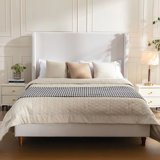 Lyerly Upholstered Wingback Bed