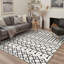 Tapis zigara à motif géométrique blanc et noir lavable à la machine avec envers antidérapant Abrahamson-128992584