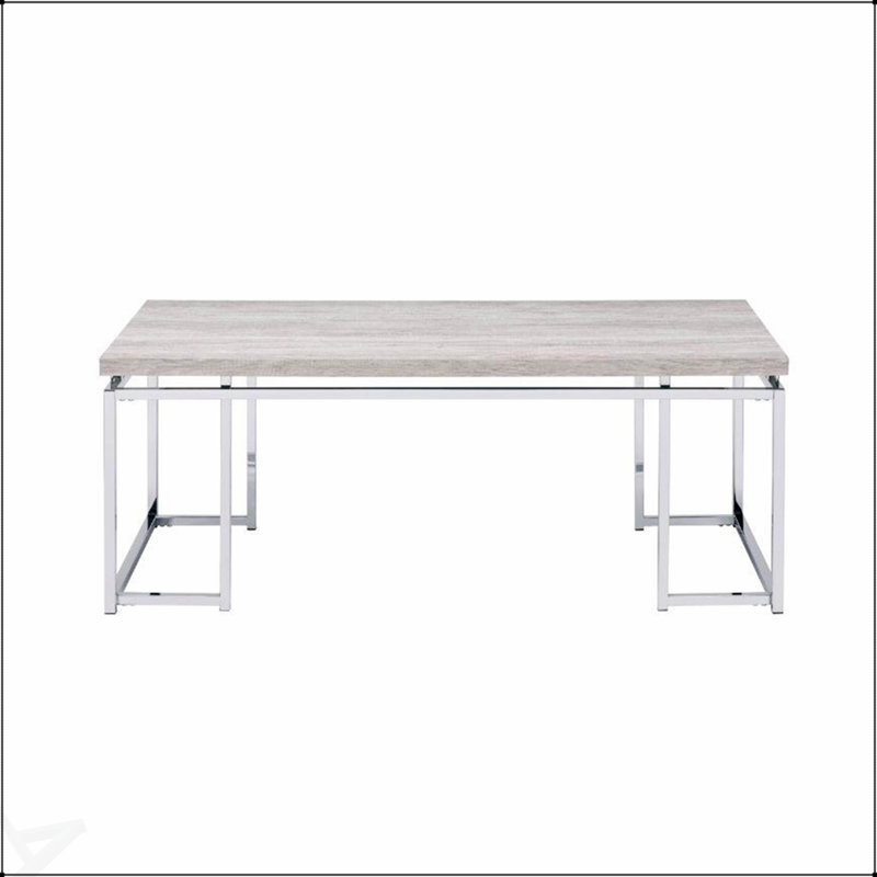 Table basse rectangulaire avec base en métal, combinant placage de chêne naturel et élégance au fini chromé pour les espaces de vie modernes.