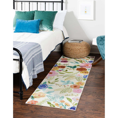 Tapis ivoire à motif floral Daignault