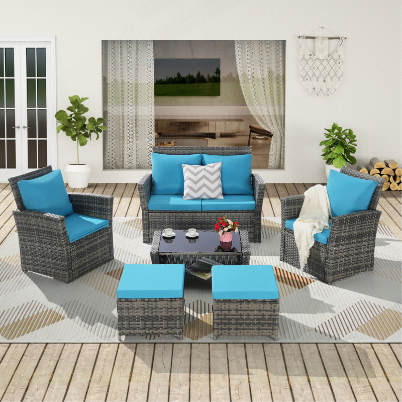 Ensemble de meubles de patio en osier 6 pièces avec repose-pieds et table basse en verre trempé, Bleu clair