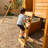 Treasure Cove Wooden Swing Set with Slides and Rock Wall