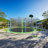 Trampoline with Slide and Swings with Basketball Hoop and Ladder with Net