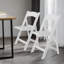 Chaise pliante simple rembourrée en plastique noir-1126831125
