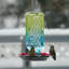 Colonne en verre antique colibri mangeoire ombre