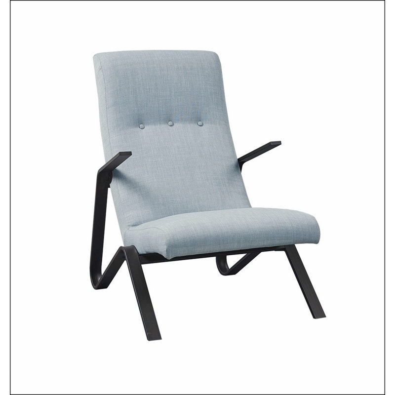 Fauteuil capitonné en tissu bleu clair