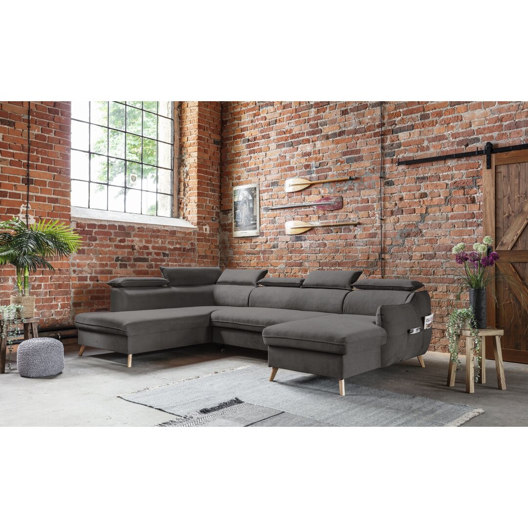 Ecksofa Henry aus Samt mit Bettfunktion