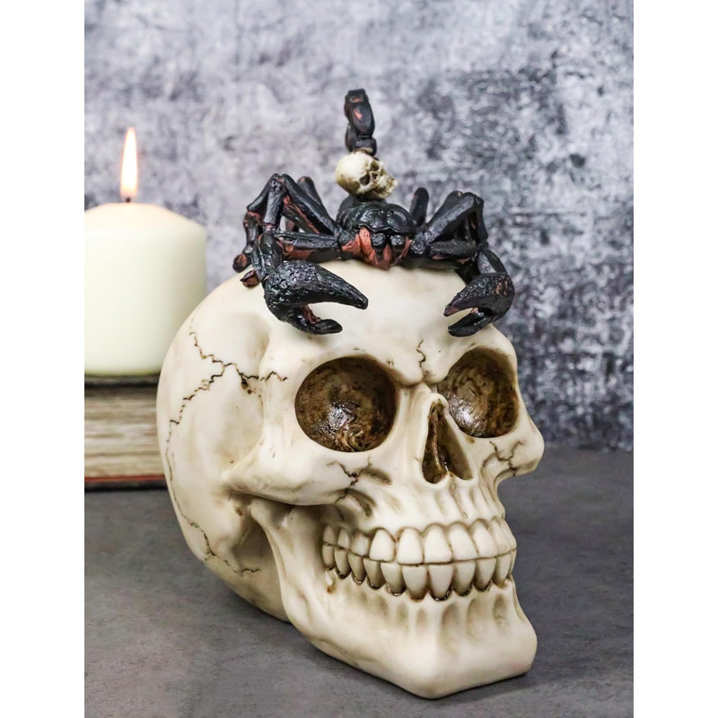 Figurine d'Halloween démoniaque sur crâne