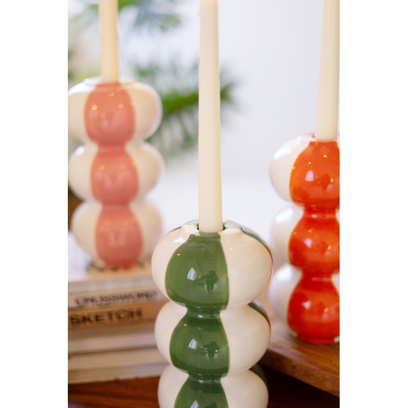  Ensemble de quatre porte-bougies en céramique à motif rayé et décoration de table