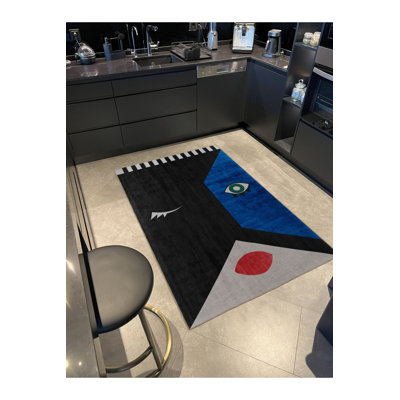Tapis lavable bleu et noir