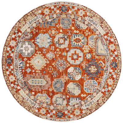 Shafiya Tufted Wool/Cotton Southwestern Rug in Rust/Ivory