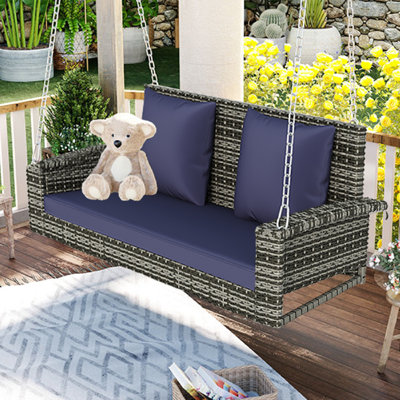 Banc de balançoire en osier avec coussin pour cour arrière