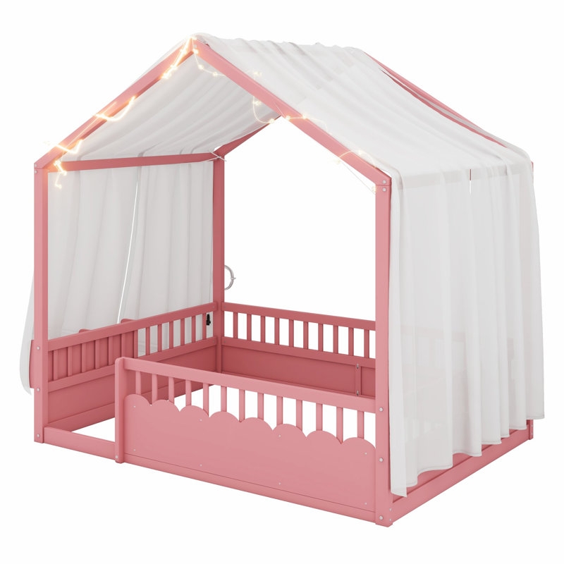 Lit Montessori au sol avec baldaquin, barrières de sécurité et porte pour des chambres d'enfants confortables et ludiques