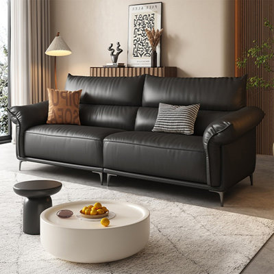 Causeuse-coussin modulable noire en cuir véritable