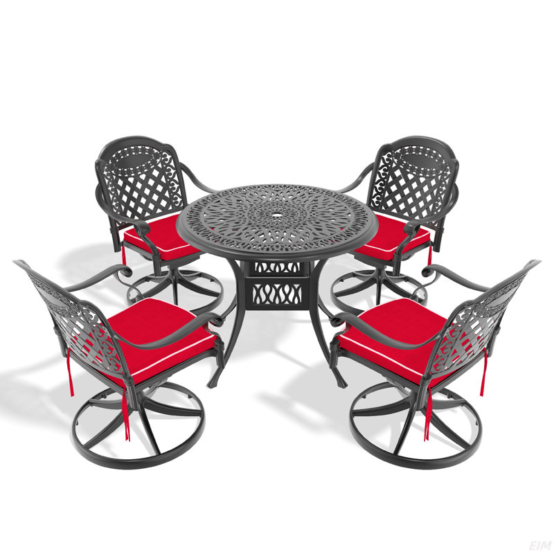 L'ensemble de salle à manger en fonte d'aluminium toutes saisons comprend des chaises pivotantes et une table avec un cadre noir