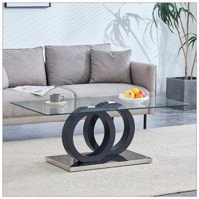 Table basse de style moderne avec plateau en panneau de fibres à densité moyenne et base stable, parfaite pour les salons et les salons