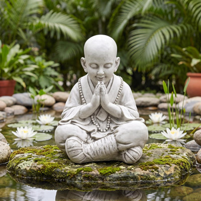 Statue de jardin asiatique priant baby bouddha