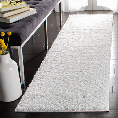 Montelongo Solid Colour Area Rug