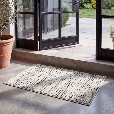 Riebe Abstract Ivory/Silver Area Rug