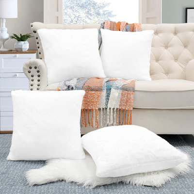 Housse de coussin réversible en fausse fourrure