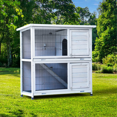 Cage à lapins à 2 étages avec enclos extérieur, dimensions : 104 cm (L) x 50 cm (l) x 50 cm (H), 2 plateaux amovibles, rampe antidérapante, toit et clôture étanches. Parfait pour les petits animaux d'intérieur. Caractéristiques : anti-fuites.