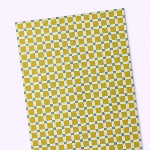 Motifs à carreaux verts et jaunes.