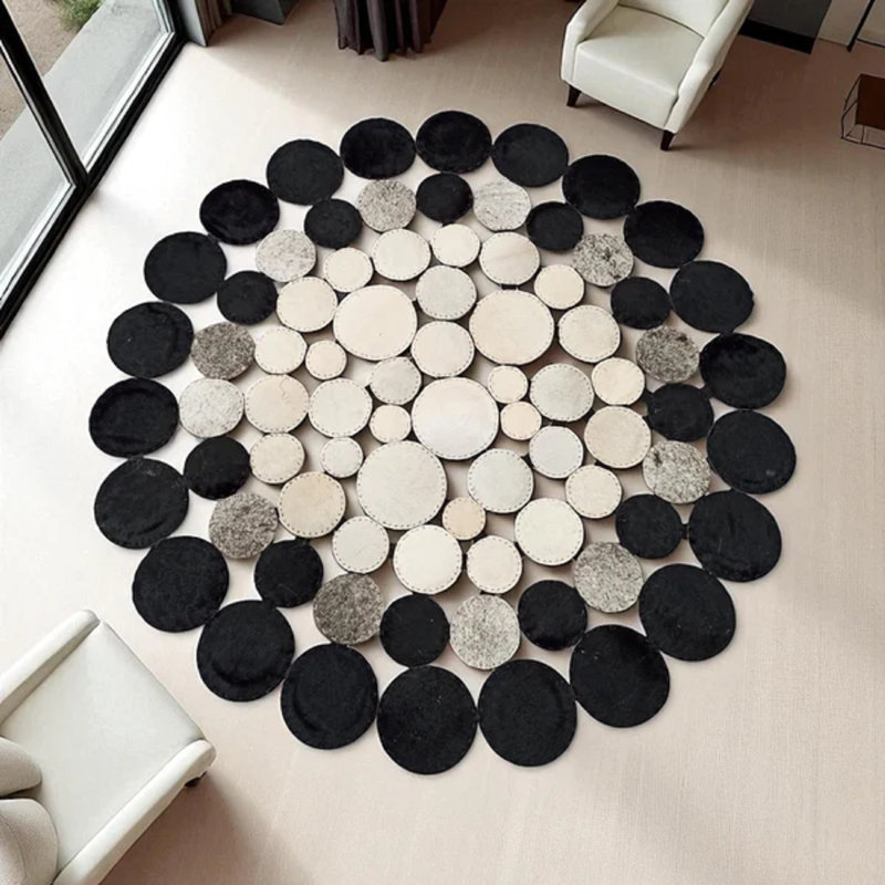Tapis rond en patchwork de cuir de vache Texas Star