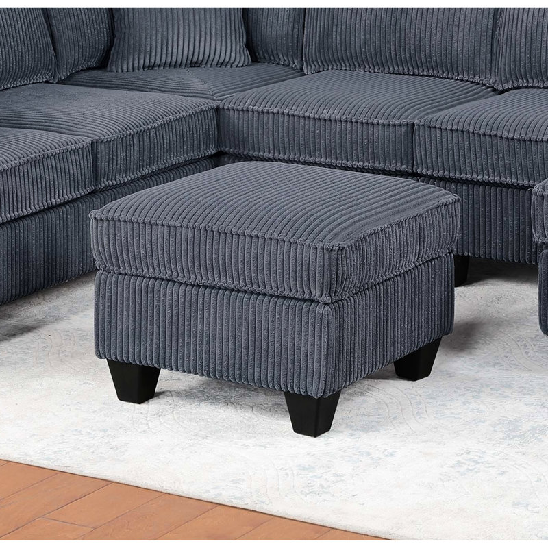 Canapé d'angle contemporain gris foncé 5 pièces, comprenant une méridienne, une chaise longue, un coin, un fauteuil sans accoudoirs et une table basse. Design moderne pour salon, salle de bain principale.