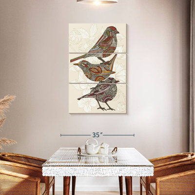 Trois petits oiseaux en ronce