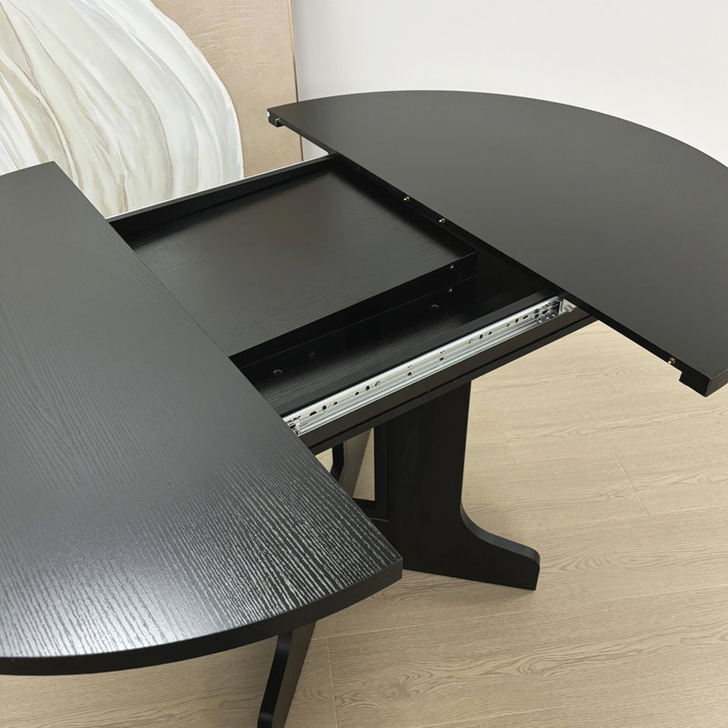 Table de salle à manger extensible ovale avec rallonge amovible, idéale pour une cuisine de style campagnard.