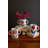 SET OF THREE CERAMIC DOUBLE HANDLE VASES WITH FLOWERS