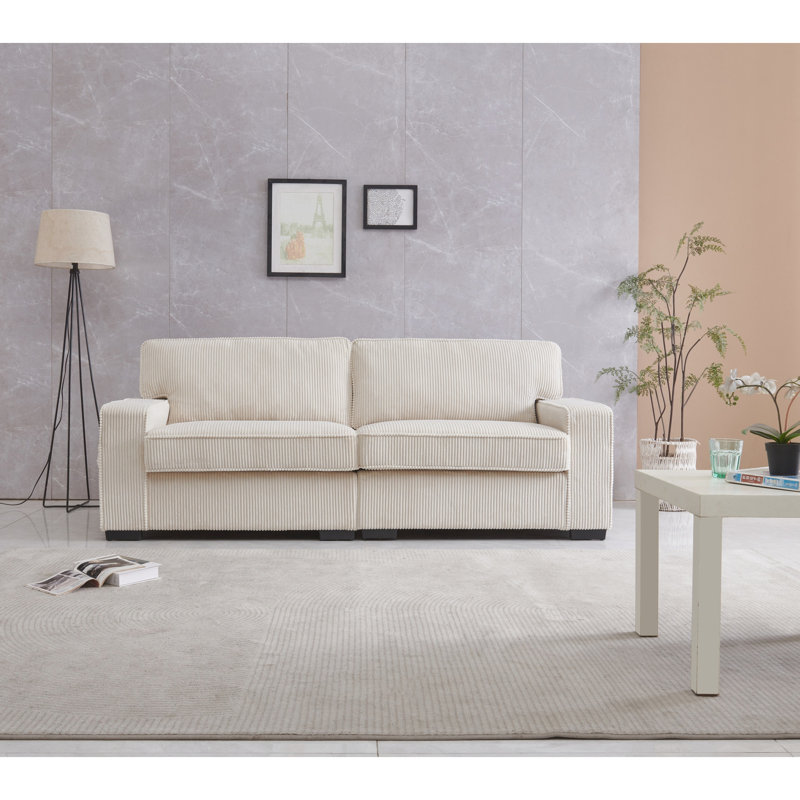 Canapé deux places élégant couleur crème, structure et revêtement en velours doux avec assise réglable couleur crème, appuie-tête confortables et coussins enveloppés de mousse