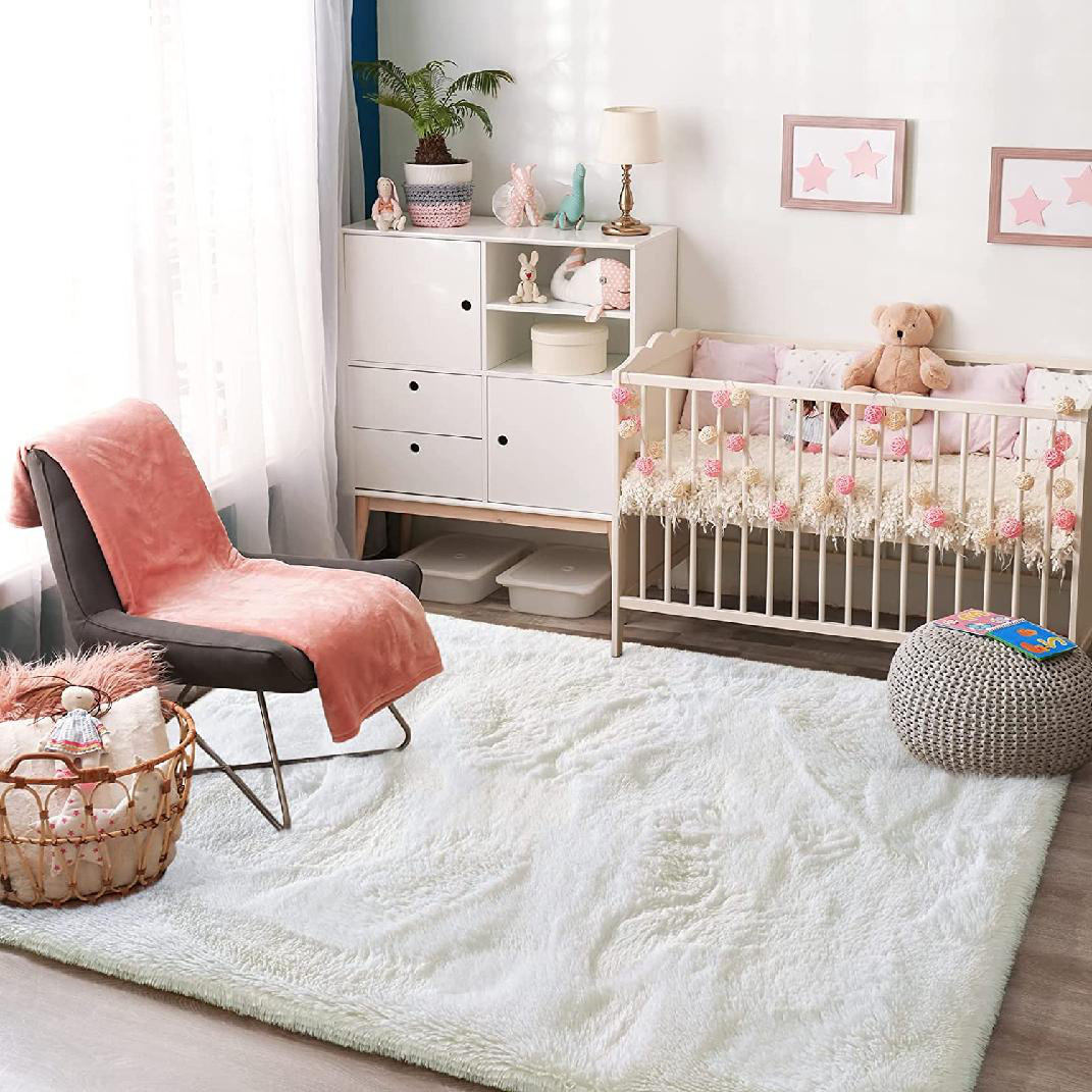 Mercer41 Derrien Solid Color Machine Woven Faux Fur Area Rug in Cream ...