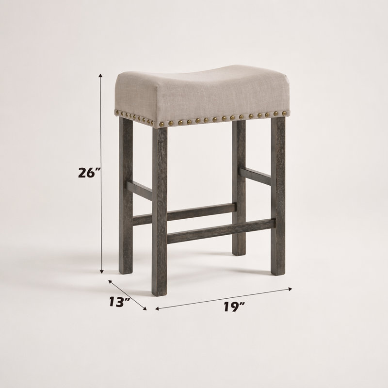 Ensemble de tabourets à hauteur de comptoir en lin et gris patiné, peu encombrants et élégants pour la salle à manger ou le bar
