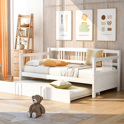 Lit de jour simple avec lit gigogne caché, lit en bois fabriqué pour l'efficacité énergétique dans l'espace blanc et multifonctionnel