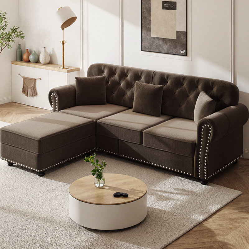 Canapé modulaire rembourré en L de 82,6 po en forme de L avec repose-pieds, style Chesterfield de style Mid-Century, capitonné avec garniture cloutée et accoudoirs roulés, comprend 3 coussins