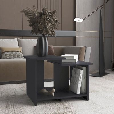 Table basse rectangulaire noire avec tablette ouverte pour un rangement pratique et polyvalent