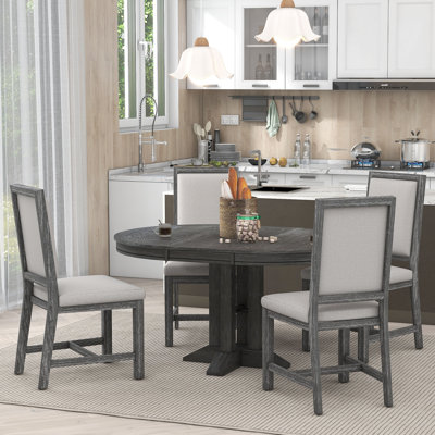 4 - Person Extendable Pedestal Dining Set