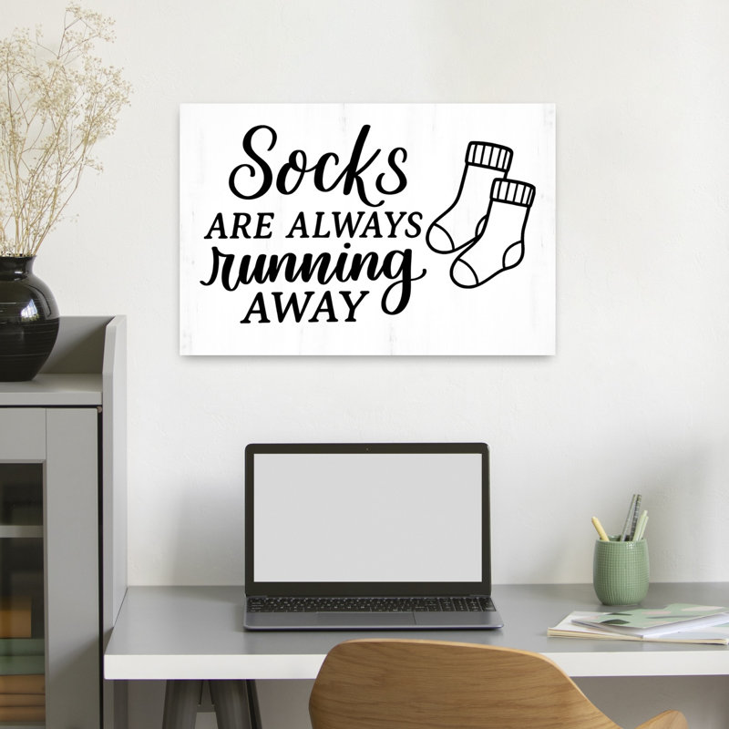 Socks Running Away by Imperfect Dust - Wrapped Canvas Print, 40.64cm H x 60.96cm W