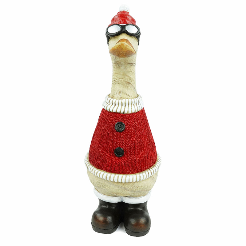 Noël canard de Noël en chandail rouge et chapeau statuaire