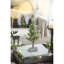 Arbre de Noël en PVC sur base en bois avec neige