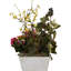 Arrangement floral mélangé dans un pot de fleurs