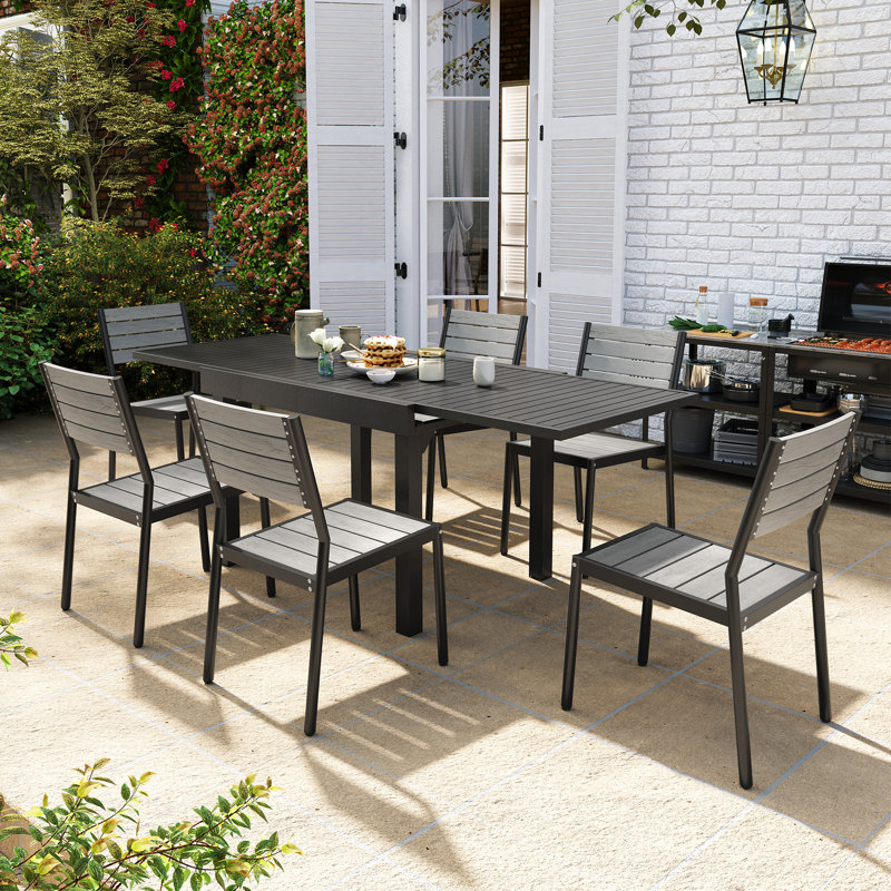 Betania Rectangular 6 - Person Outdoor Dining Set - Extendable Aluminum Table, 6 Armless Chairs, 6