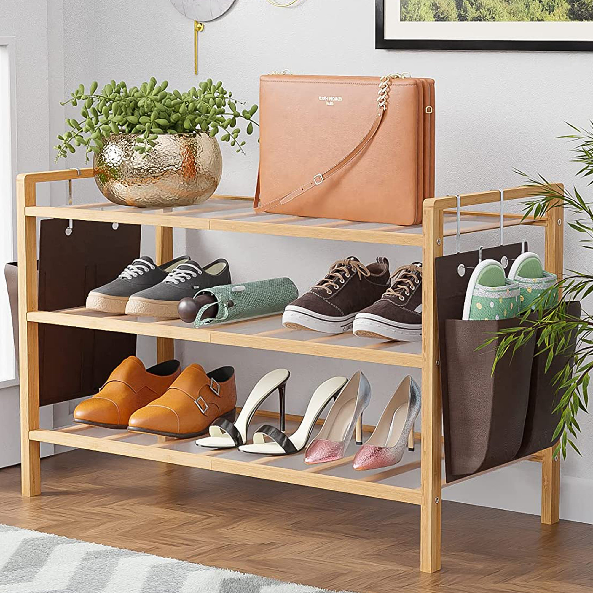 https://assets.wfcdn.com/im/08781395/compr-r85/2337/233759716/3-tier-organizer-bamboo-shoe-rack-with-two-removable-side-bags.jpg